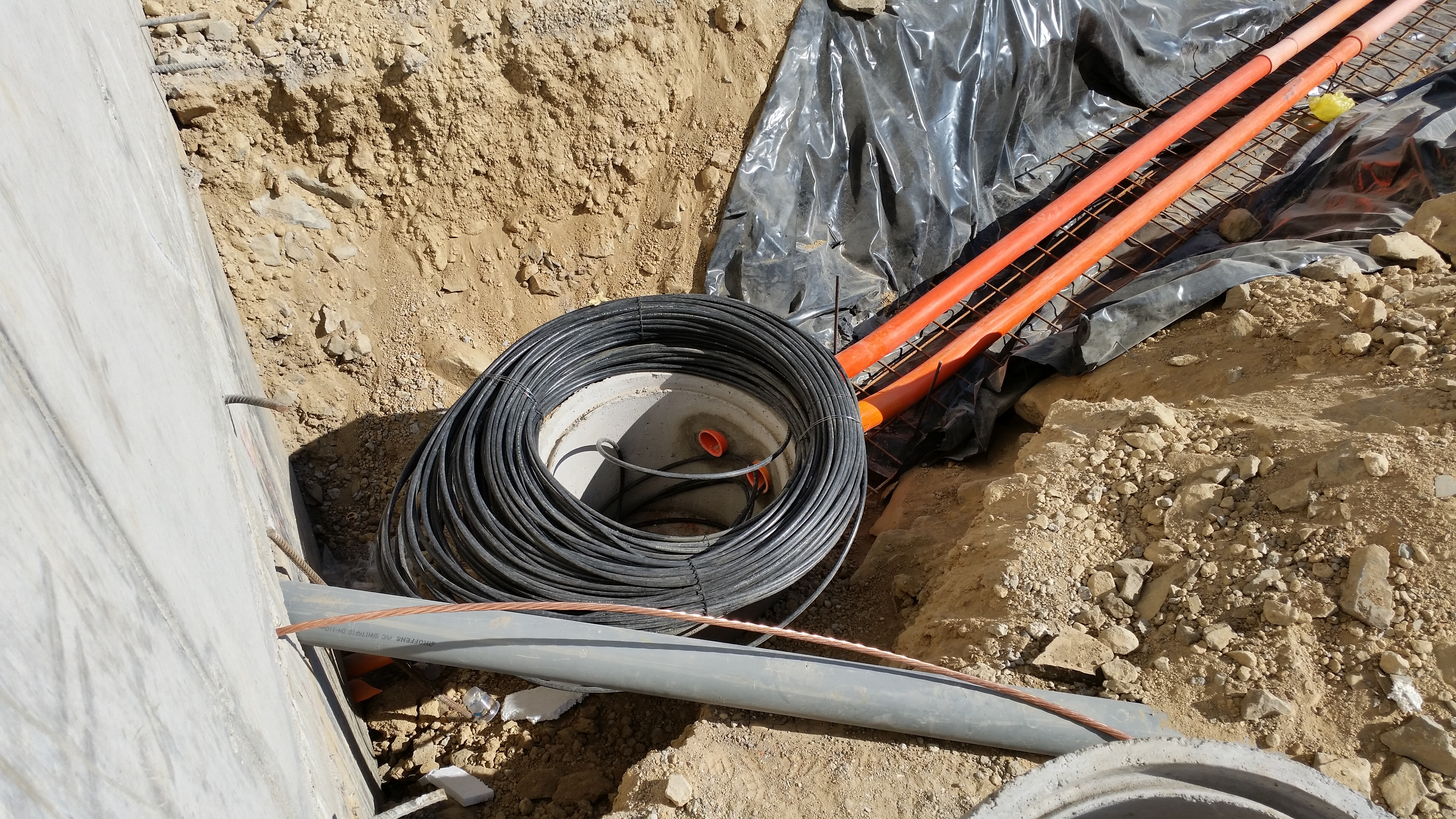 Fiber optic cable installation during construction work