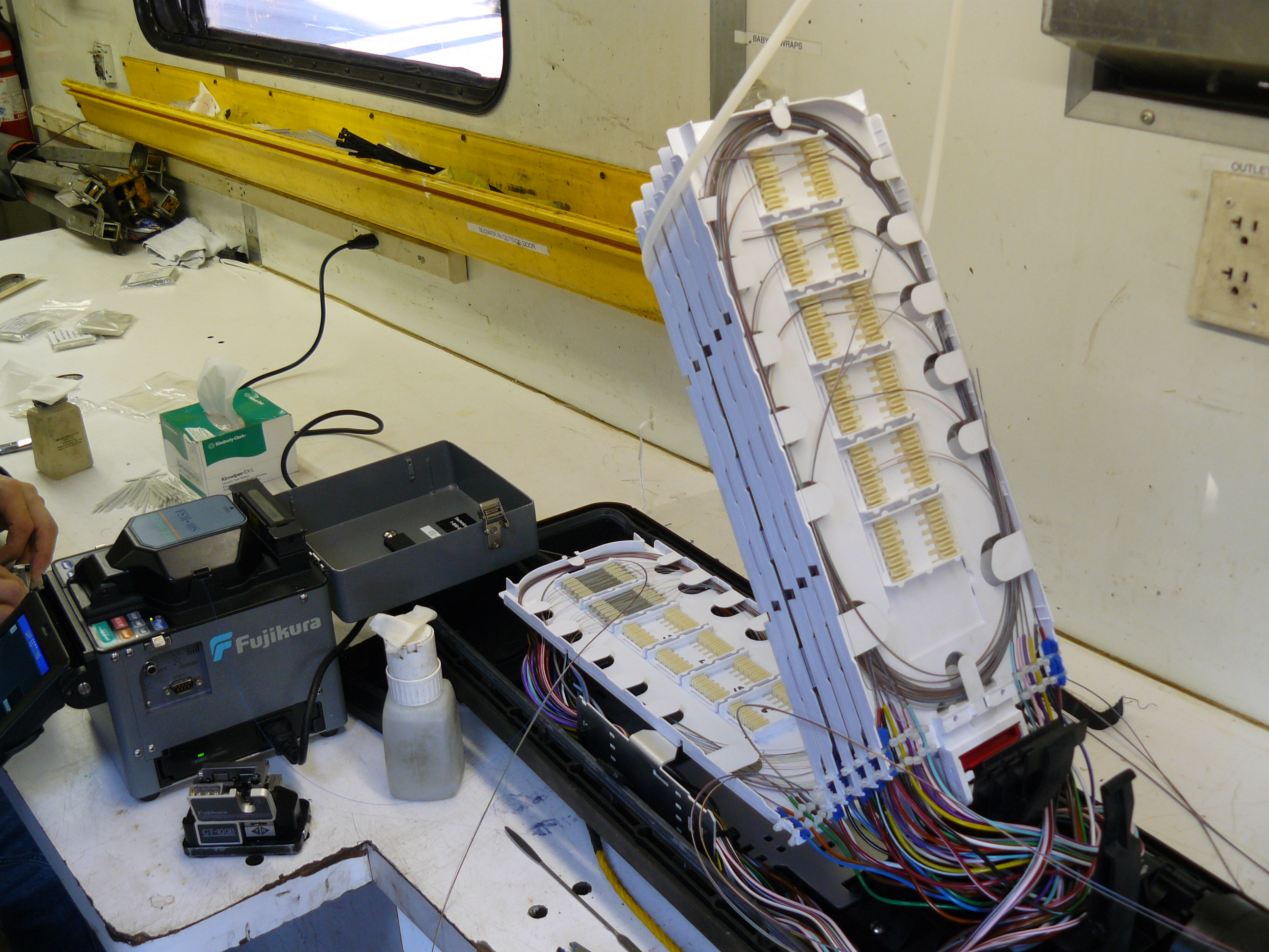 Fiber splice case opened during technical work